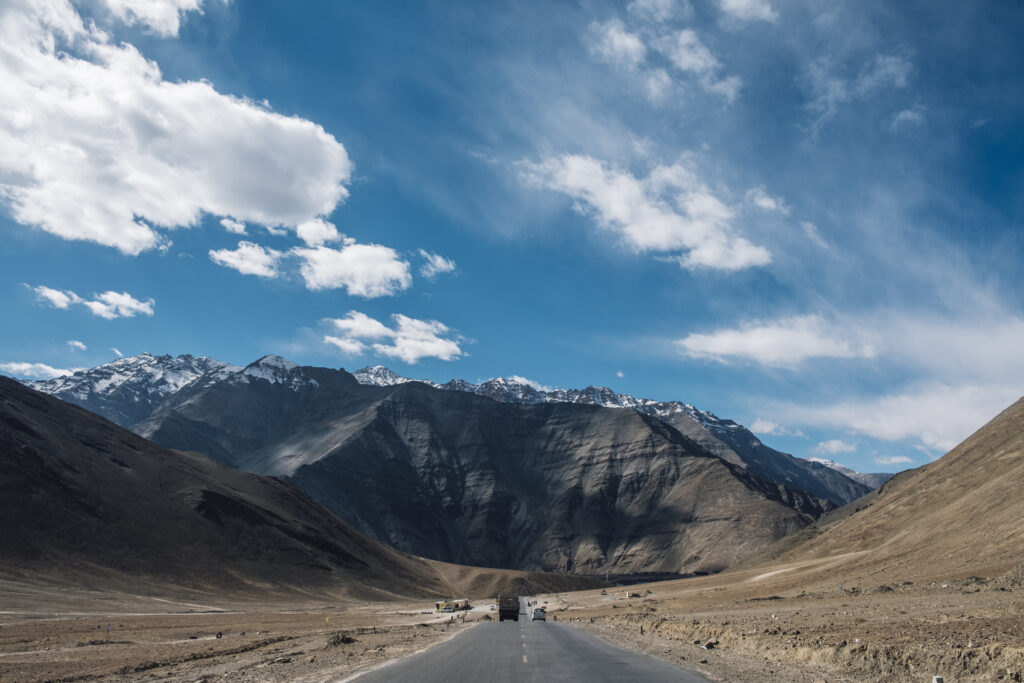 magnetic hill mountain blue sky road way leh ladakh india